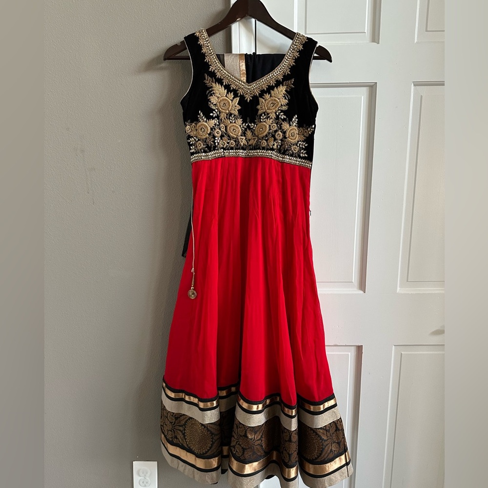 Elegant Red and Black Dress with Gold Embroidery